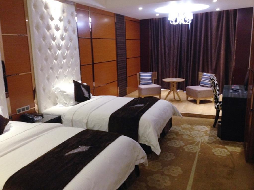 Tianguo Times Hotel Foshan Quarto foto