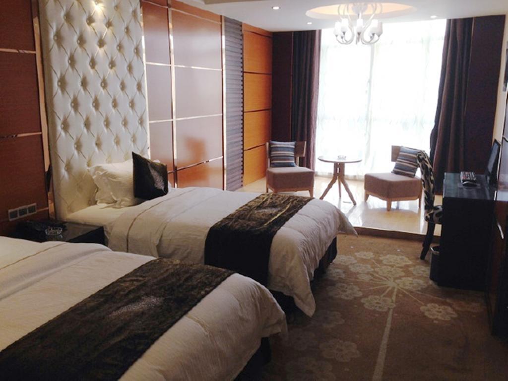 Tianguo Times Hotel Foshan Quarto foto